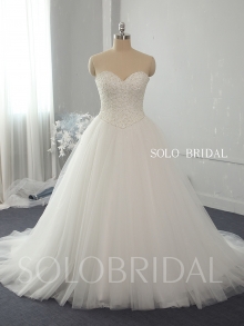 Ivory sweetheart strapless ball gown tulle heavily beaded diamond bodice bridal gowns
